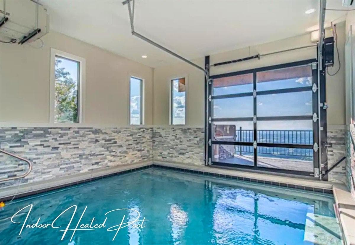 Enjoy the luxury of an indoor pool, offering privacy and serene mountain views through expansive windows.