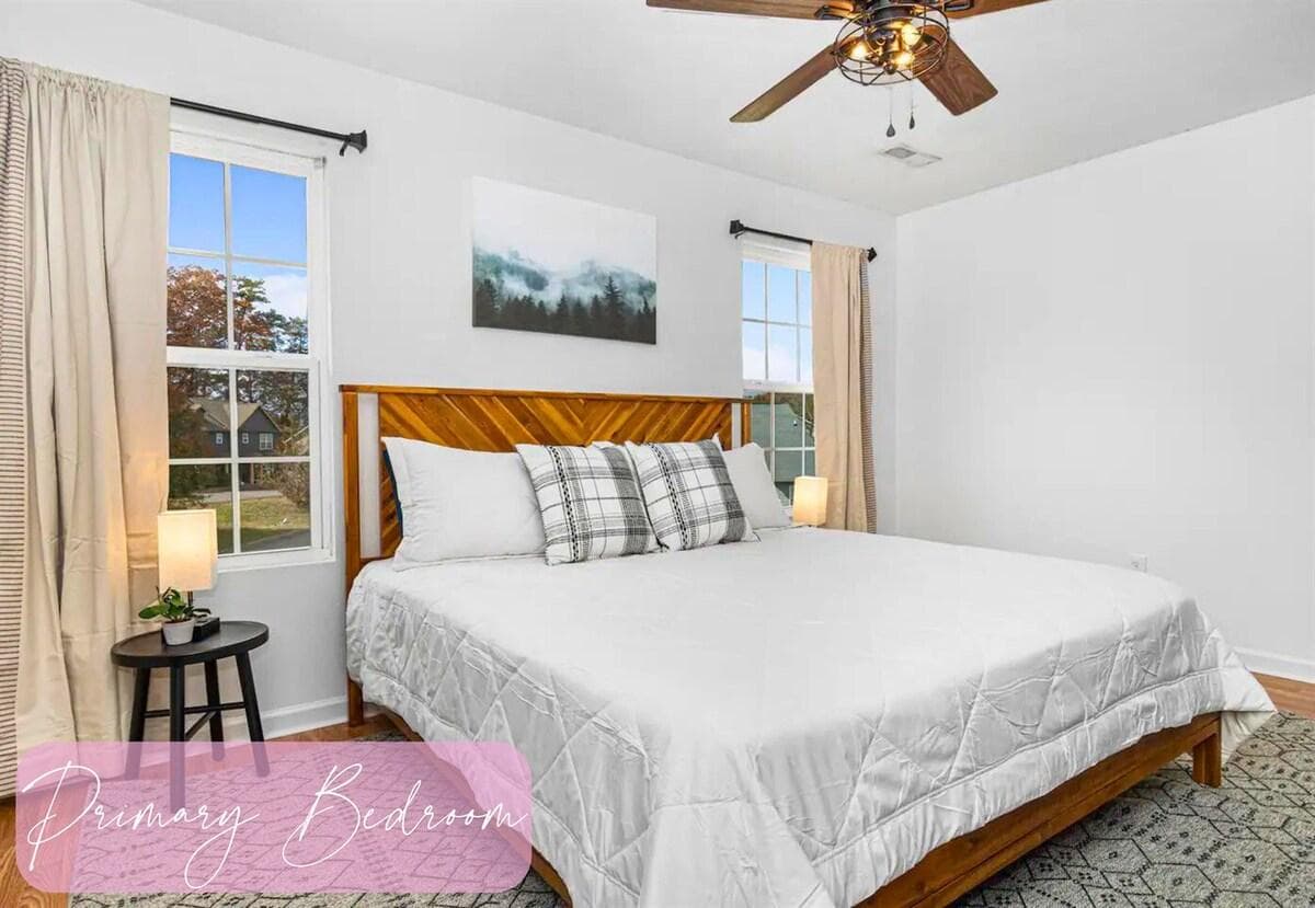 Rest easy in the primary bedroom where simplicity and comfort meet for a peaceful night's sleep.