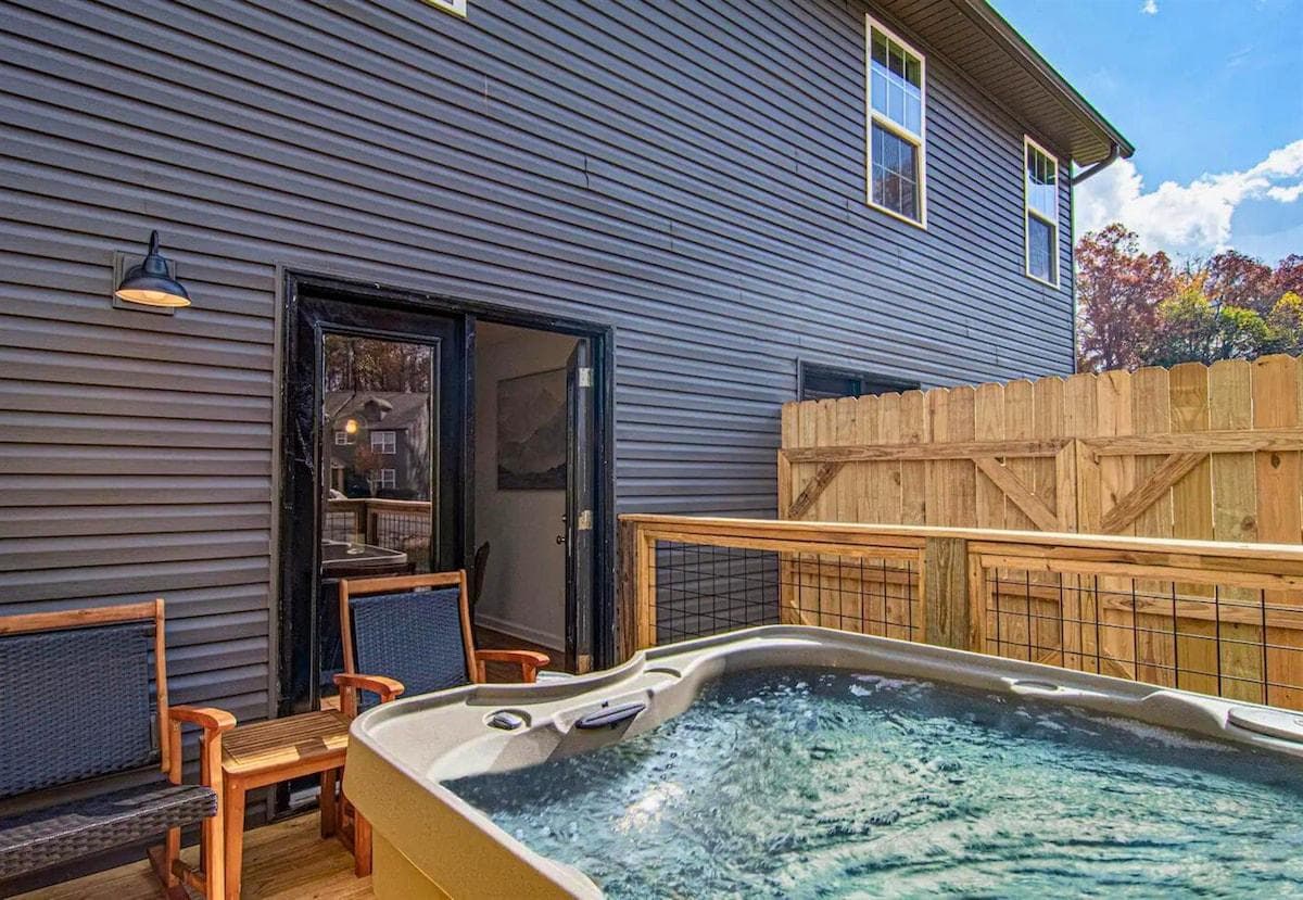 Take a dip in your private hot tub on the deck, the perfect spot to relax after a day of exploring